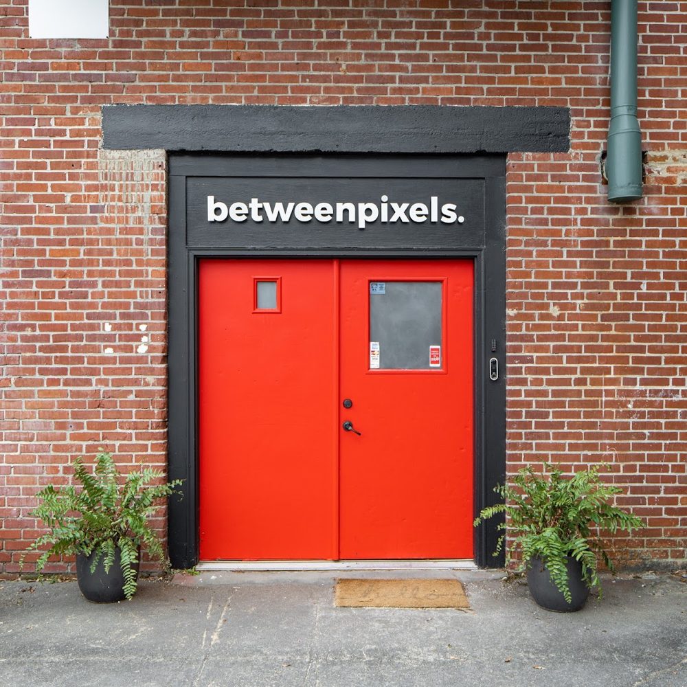 The Blended Studio entrance in Marietta — the betweenpixels red doors